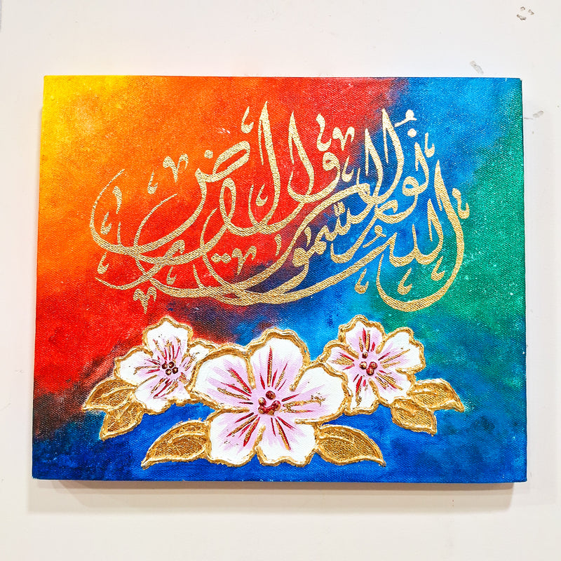 “Allah is the Light of the Heavens and the Earth” – Handmade Islamic Calligraphy Canvas with Floral Art (12x10 Inches)